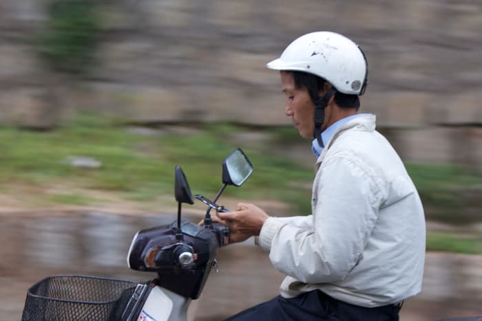 distracted-driving-on-motorcycle-20